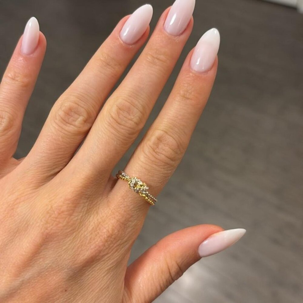 The Claire gold silver twist dainty love knot ring two tone